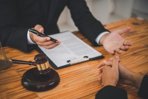 A lawyer gives advice to a client about the Criminal Injuries Compensation Scheme.