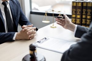 A specialist solicitor is talking with their client 