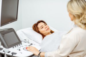 PERSON RECEIVING CARE FOR BREAST CANCER TREATMENT