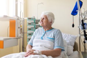 ELDERLY PERSON IN HOSPITAL AFTER RECEIVING BREAST CANCER DIAGNOSIS