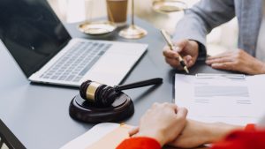 A solicitor helping their client with a hit and run compensation claim
